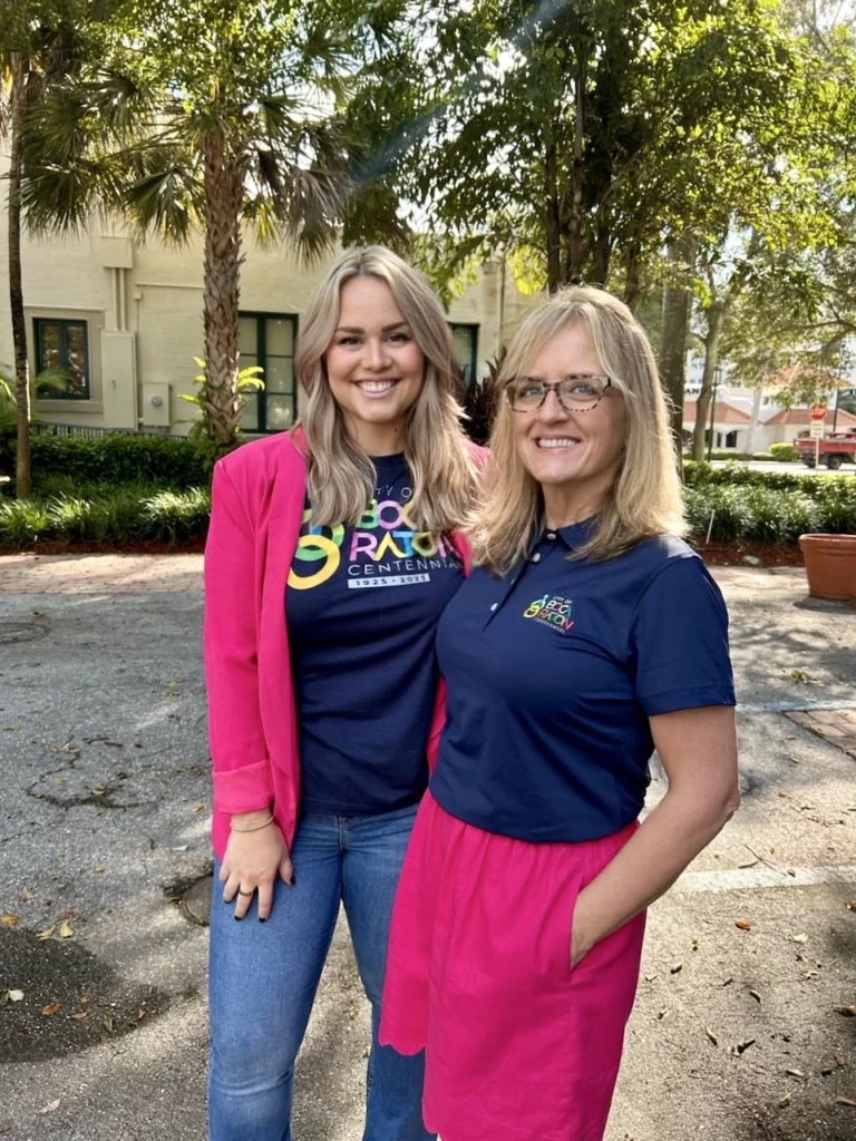 Event organizers pose together to celebrate the poetry event.