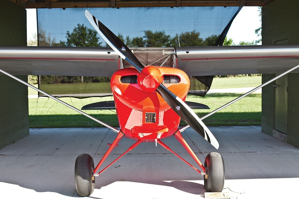 Sky’s the Limit in a Small-Craft Airplane 3 A kit-built airplane parked under a shade-hangar at Grass Roots Airpark in Groveland; Photograph by Jeremiah Stanley