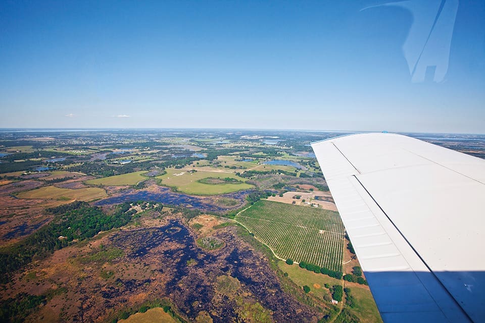 Sky’s the Limit in a Small-Craft Airplane 2 A bird’s eye view of Groveland, in central Florida; Photograph by Jeremiah Stanley
