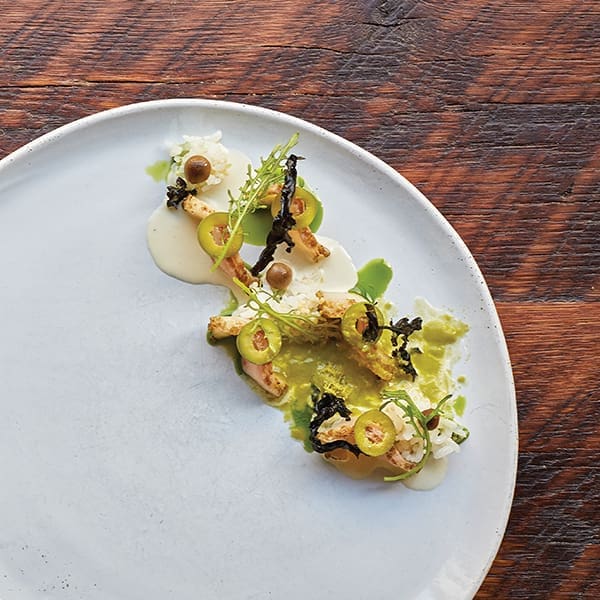 Shaved Cobia with Olive Snow, Shiitake, Sushi Rice, Toasted Dashi & Garlic Oil shared by Chef Brad Kilgore; Photography by Kelly Sterling