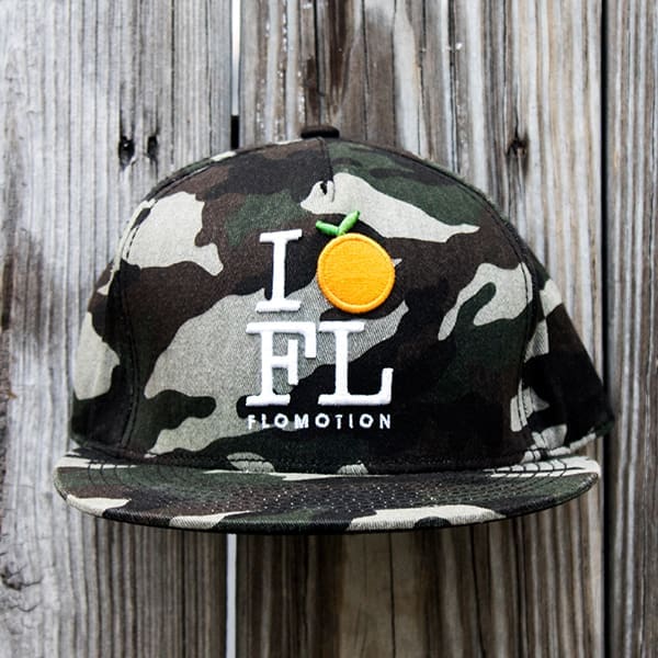 Made in FLA: Go with the Flomotion 2 Trucker hat with signature "orange" logo; Photography by Jackson Berger