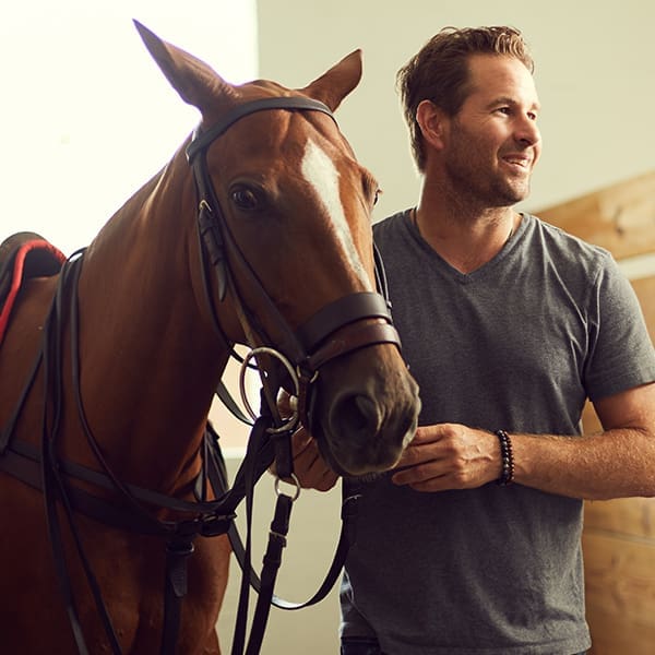 A close-up of Honey Badger and Brandon Phillips, who look away from the camera.