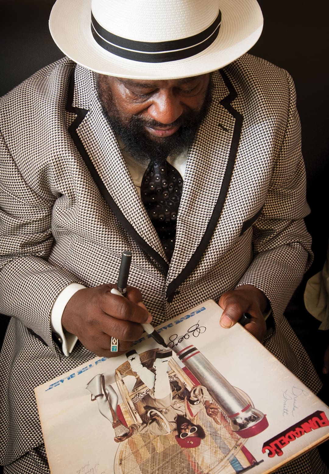 Bringing Back the Funk With P-Funk Legend George Clinton 11 George Clinton signing one of his records