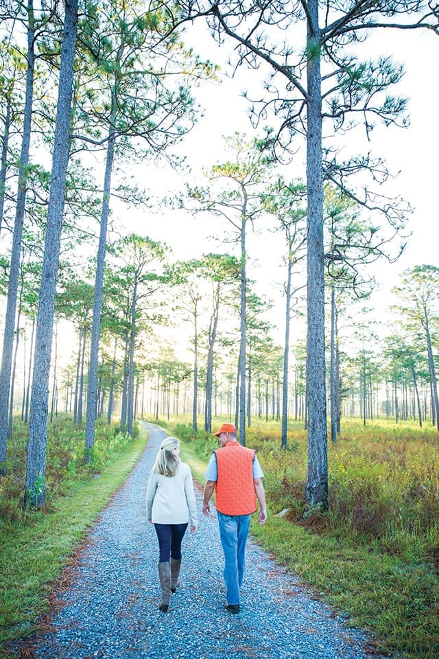 For The Love Of Dogs (and Quail Hunting) 11 Slade Sykes and a Baker family member walk through the longleaf pine forest on a recent fall morning