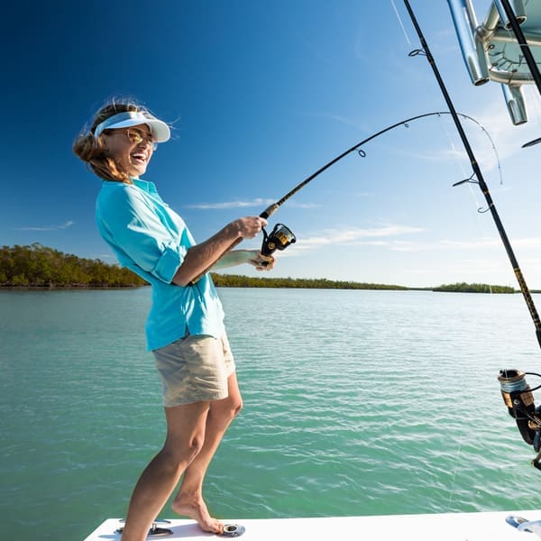 Woman Backwater Fishing Off of Keewaydin Island 00525.600