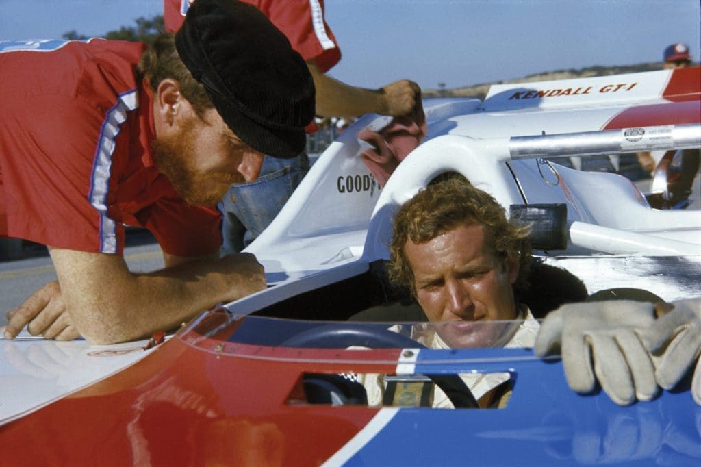 Racing Icon Hurley Haywood Gets Real About His Personal Life & Career 6 Haywood sits down in his car, the Porsche 917-10
