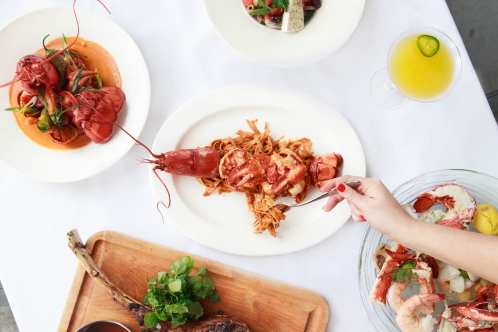 LBSG Spread with Whole Lobster Pasta Americaine credit Alchemy