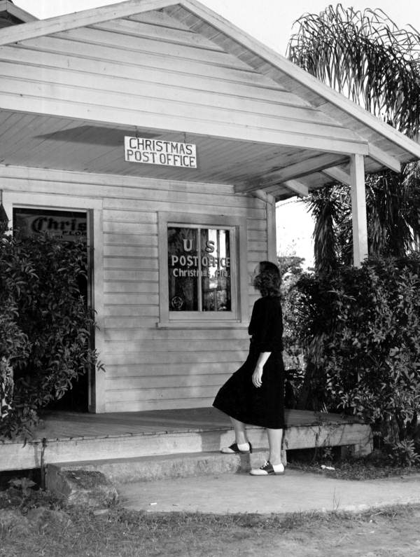 Juanita Tucker entering the post office 1947