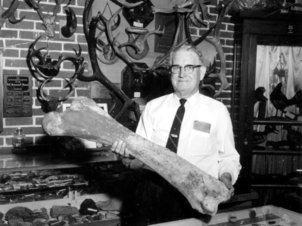 A Tale of Two Toms and the Three K’s 2 T.T. Wentworth holding a bone at his museum