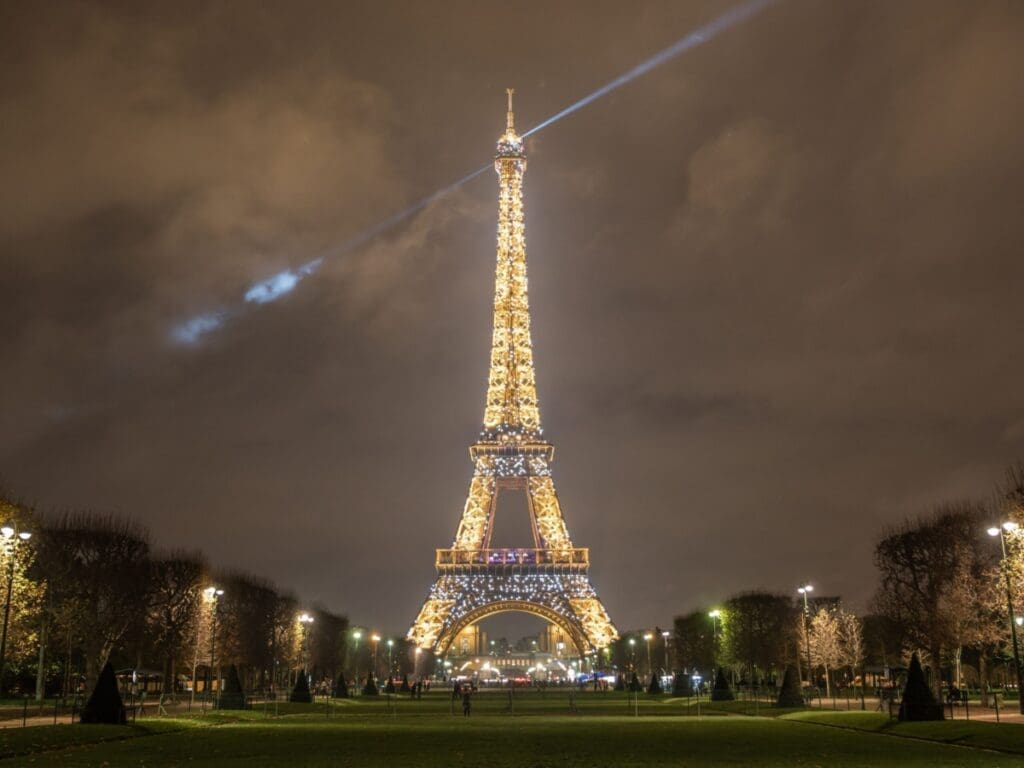 Say Oui to Paris: A New Miami Flight Got Me there Faster and for Less 1 Tour Eiffel illuminee depuis Champs de Mars E.Li 2 scaled e1678895916835