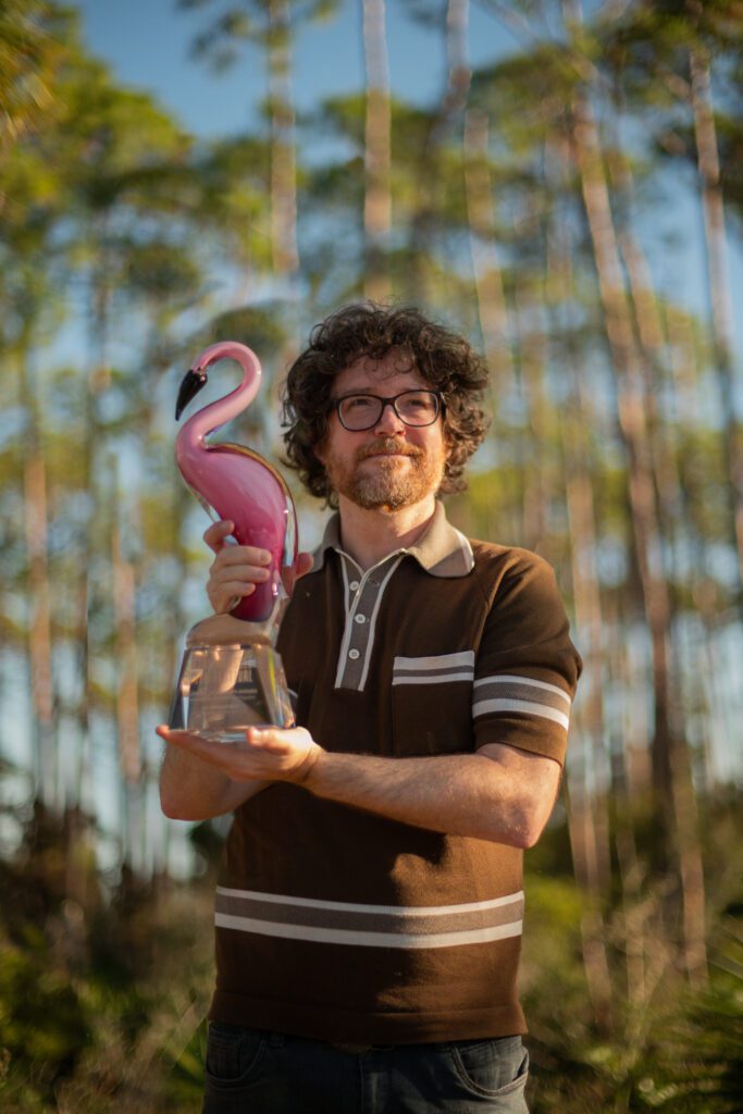 Ian Weir with the Flamingo award