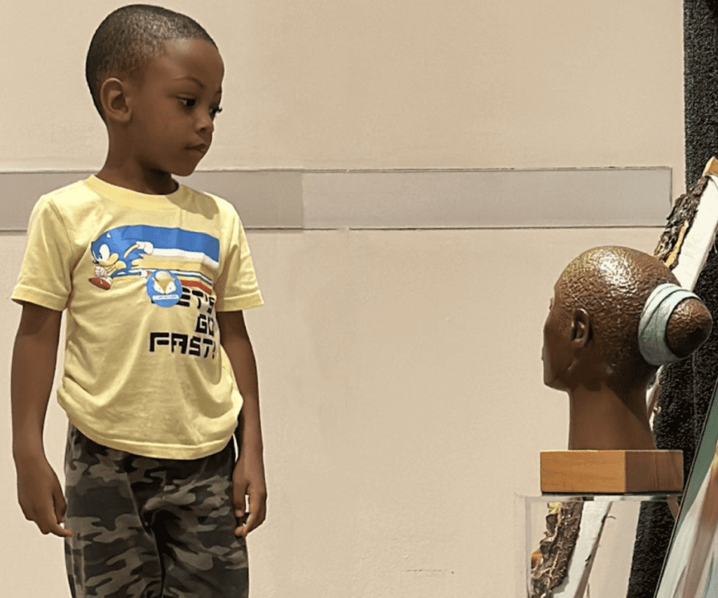 The Rollins Museum of Art's New Curators See Things From a Different Perspective 1 A child curator at the Rollins Museum of Art