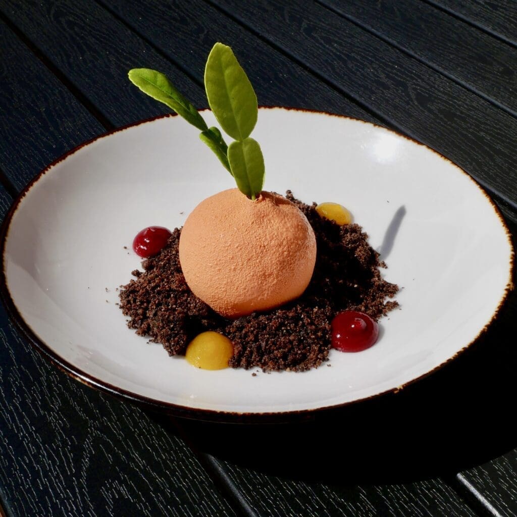 12 New Florida Openings This Spring 1 LOrange is a white chocolate shell orange compote and granache close up