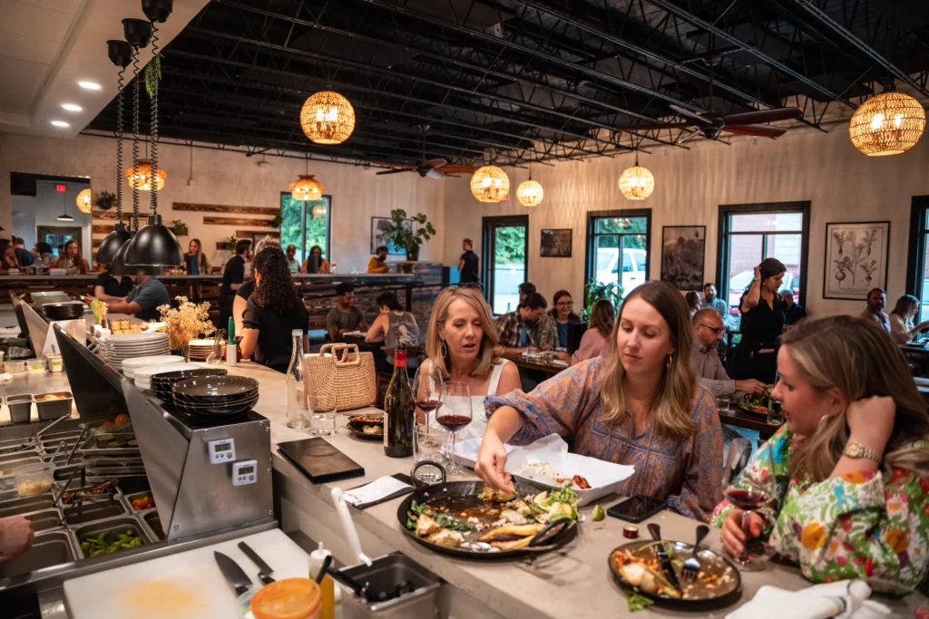 Diners chat at Tallahassee's Black Radish restaurant.