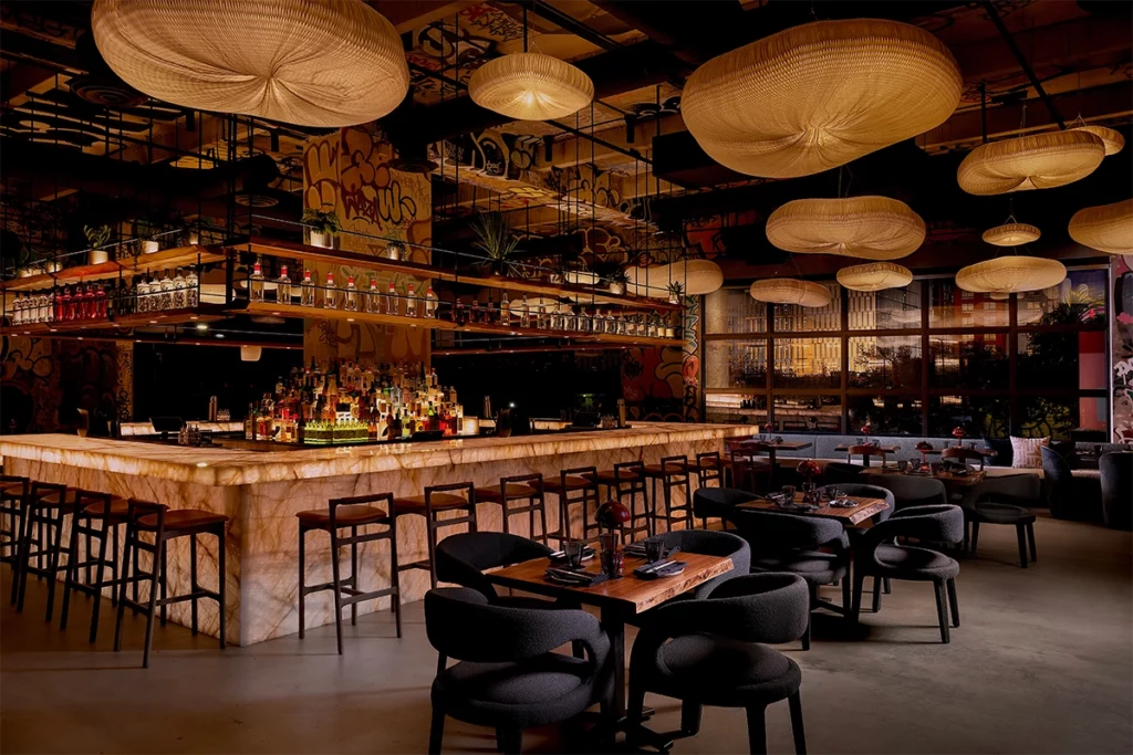 Chef Raheem Sealey is Bringing Caribbean Flare to Miami's Newest Asian Smokehouse 2 Shiso's interior design reflects Winwood's evolution, incorporating graffiti to represent the neighborhood's roots and an open, elevated concept to portray its future.
