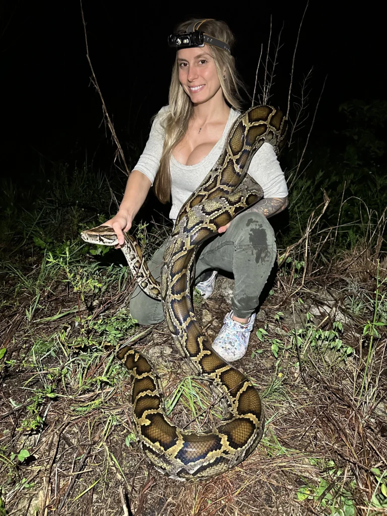 Taylor Stanberry holding a python