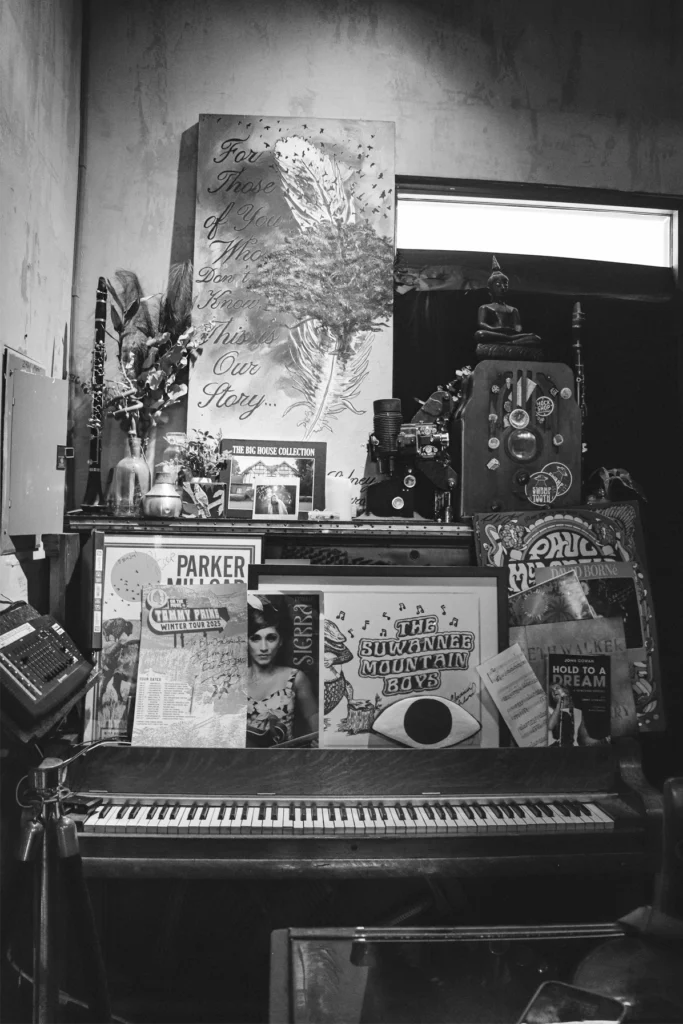 Music memorabilia and vinyl records on a wall in Blue Jay Listening Room.