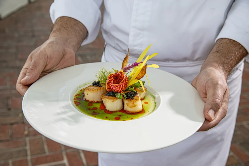 What's New at the Ponte Vedra Inn & Club 1 A Ponte Vedra Inn Dining Room scallops entree.