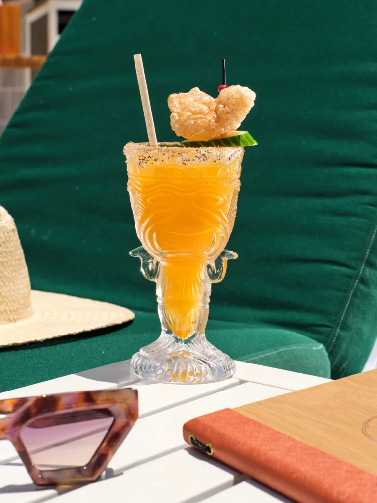 How to Make The Nectar Room’s Sweet Heat Cocktail 1 An orange cocktail.