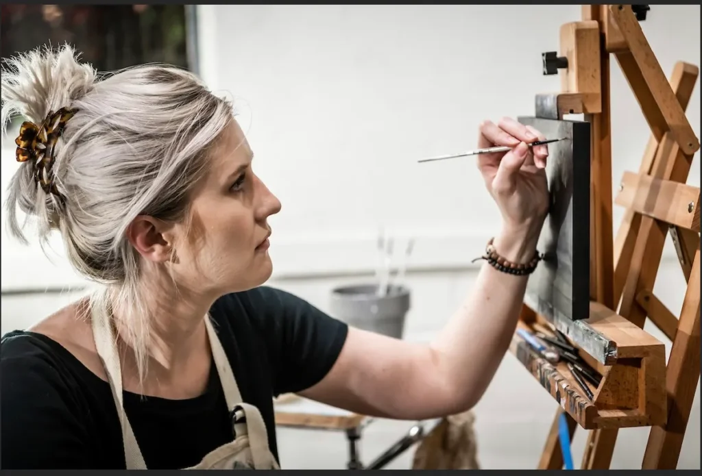 Ericka Sobrack’s Uncanny Paintings of Florida Suburbia 5 Artist Ericka Sobrack painting.