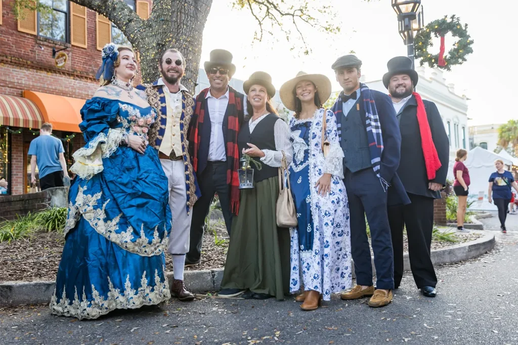 A Christmas Storybook Escape in Amelia Island 1 A group of Dickens on Centre attendees in Victorian costume.
