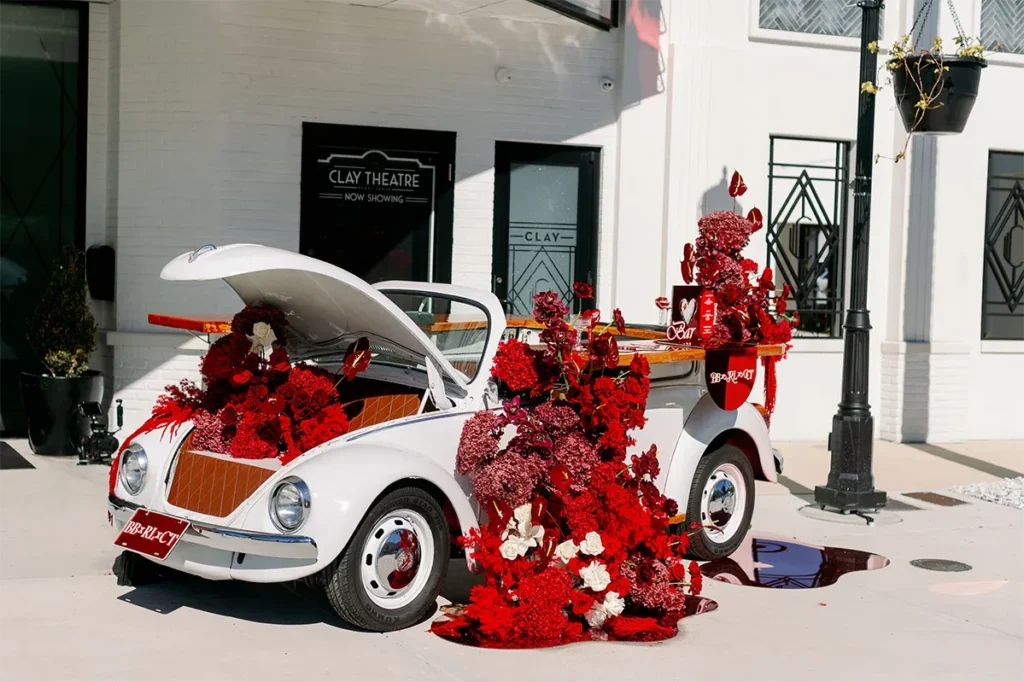 These Two Professional Partiers Are Raising the Bar (Car) 2 A close up shot of the Betty Boujee antique car, functioning as a pop-up bar.