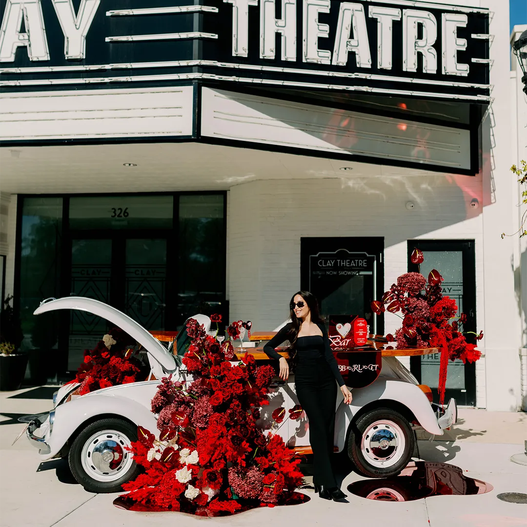 Noi Amar with Betty the Boujee Cocktail Car.