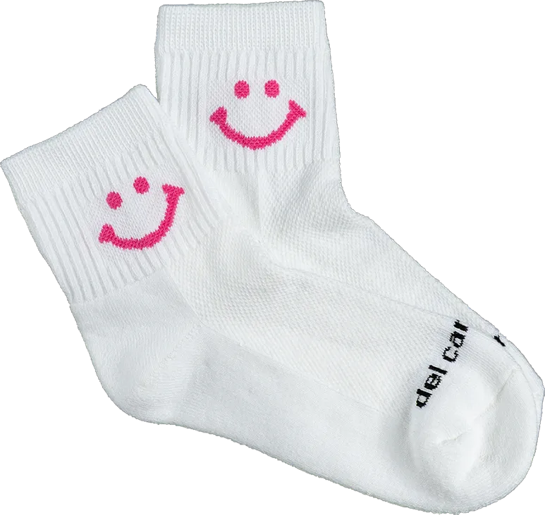 The Homegrown Holiday Edit: 2025 Gift Guide 19 A pair of Del Campo smiley socks.