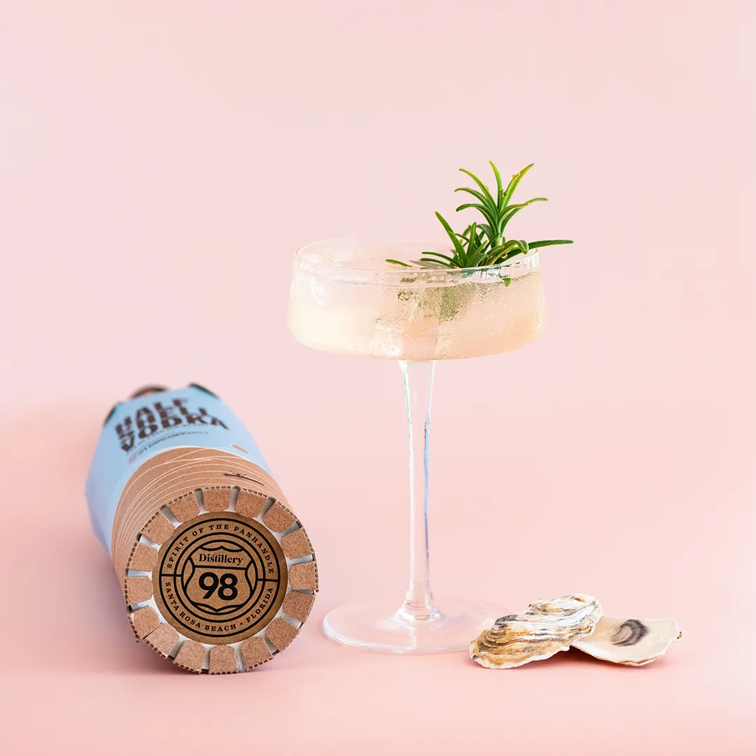 Gold Rush Cocktail and Half Shell vodka bottle.