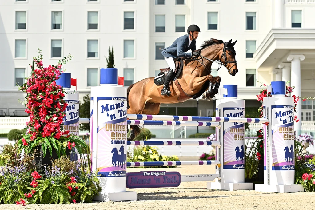 What to do this July in Florida 4 Horse jumping over barrier at World Equestrian Center.